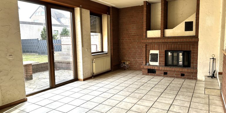 Wohnzimmer mit Kamin