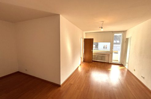 Wohnzimmer mit Balkon