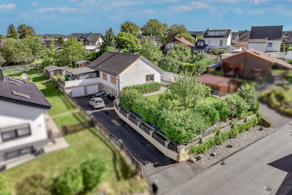 Oberpleis/Boseroth: Freistehendes EFH mit großem Grundstück, Doppelgarage und herrlichem Ölbergblick