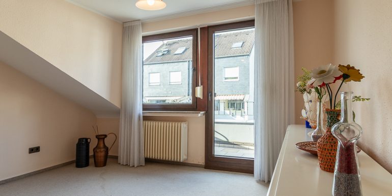 Schlafzimmer mit Balkon
