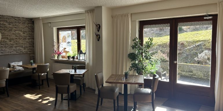 Aufenthaltsraum mit Terrasse