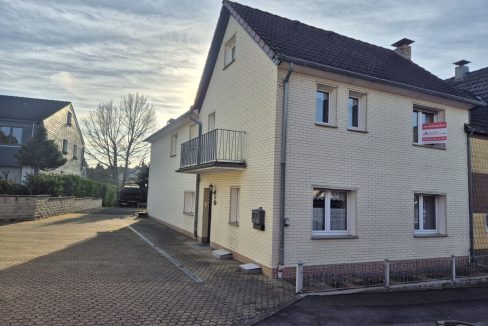 Vorne wohnen, hinten bauen