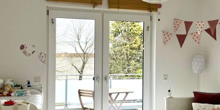 Schlafzimmer mit Balkon