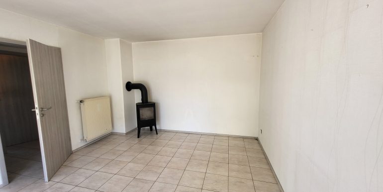 Wohnzimmer mit Kamin EG