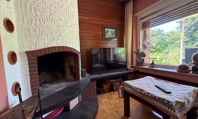 Wohnzimmer mit Kamin